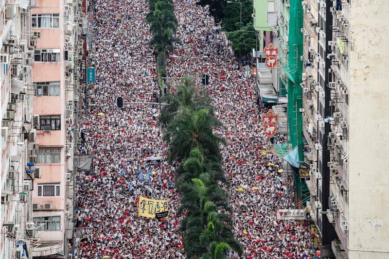 Protesters march during a rally against a controversial extradition law proposal in Hong Kong on June 9 2019. AFP