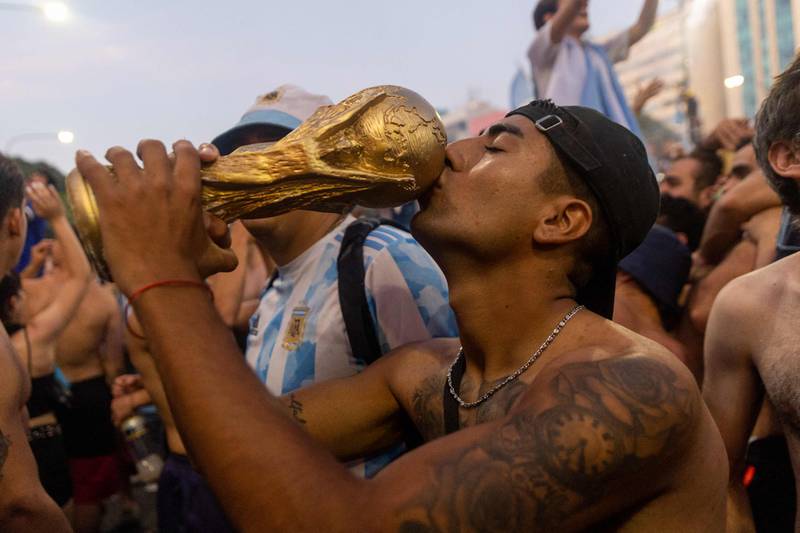 Argentina fans celebrate winning the 2022 World Cup. AFP