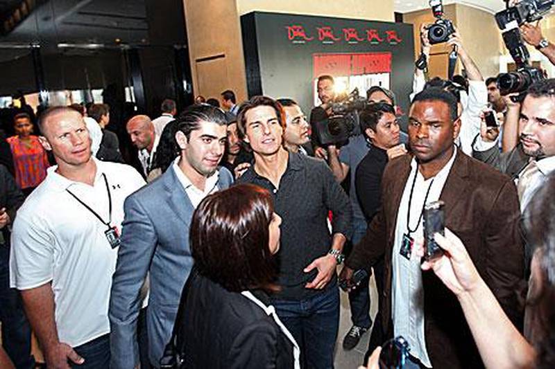 Tom Cruise and other actors and executives discuss the filming of Mission: Impossible Ghost Protocol while making a stop at the Armani Hotel in Dubai yesterday.