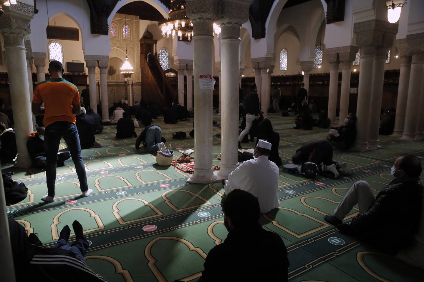 Muslims pray during the first day of Ramadan at the Paris Mosque last April. AP Photo