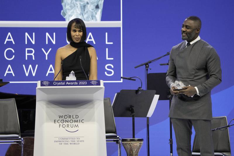 Actor Idris Elba, right, and his wife Sabrina Dhowre Elba, left, smile on the podium during the Crystal Award ceremony. AP