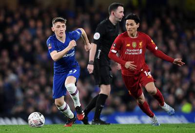 LONDON, ENGLAND - MARCH 03: Billy Gilmour of Chelsea and Takumi Minamino of Liverpool in action during the FA Cup Fifth Round match between Chelsea FC and Liverpool FC at Stamford Bridge on March 03, 2020 in London, England. (Photo by Shaun Botterill/Getty Images)