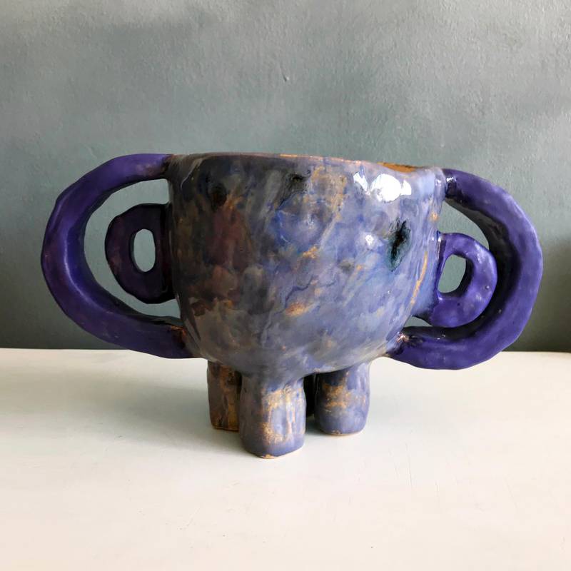 Osipova is primarily a ceramic artist, creating small sculptures and designing plant pots that she sells online or at craft fairs