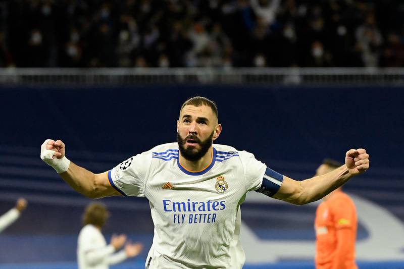 Real Madrid's French forward Karim Benzema celebrates after scoring his team's second goal. AFP
