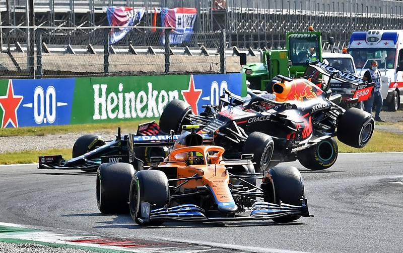 Max Verstappen and Lewis Hamilton crash out of the race. Reuters