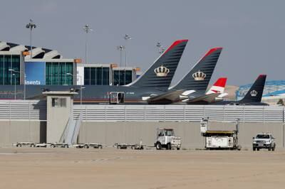 Planes belonging to Royal Jordanian and other airlines park at Queen Alia International Airport in Amman. Reuters