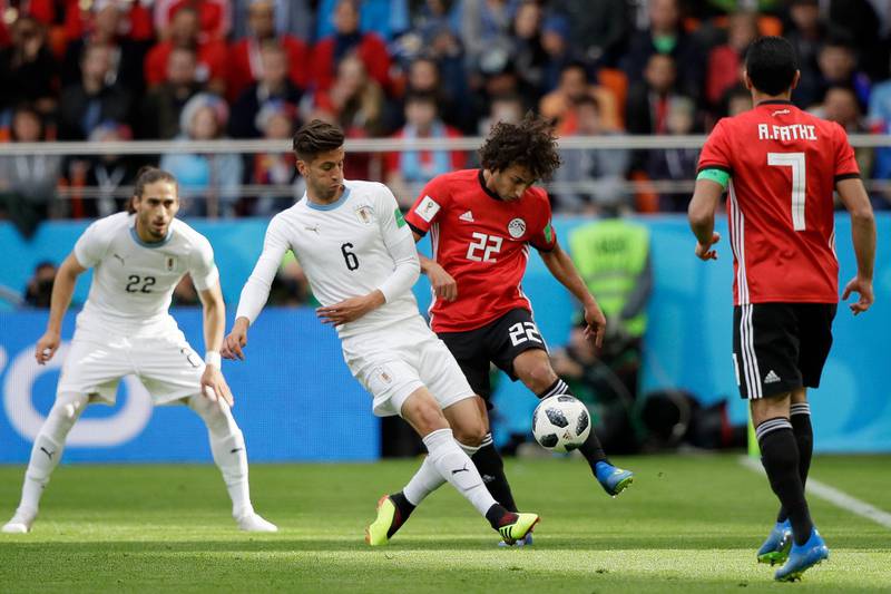 Uruguay's Rodrigo Bentancur, left, and Egypt's Amr Warda challenge for the ball during their group A match at the 2018 FIFA World Cup at the Yekaterinburg Arena in Yekaterinburg, Russia, on June 15, 2018. Mark Baker / AP Photo