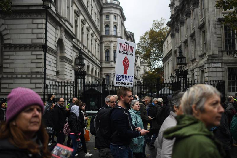 Protesters march past Downing Street during a Unite for Freedom march in London. Getty Images