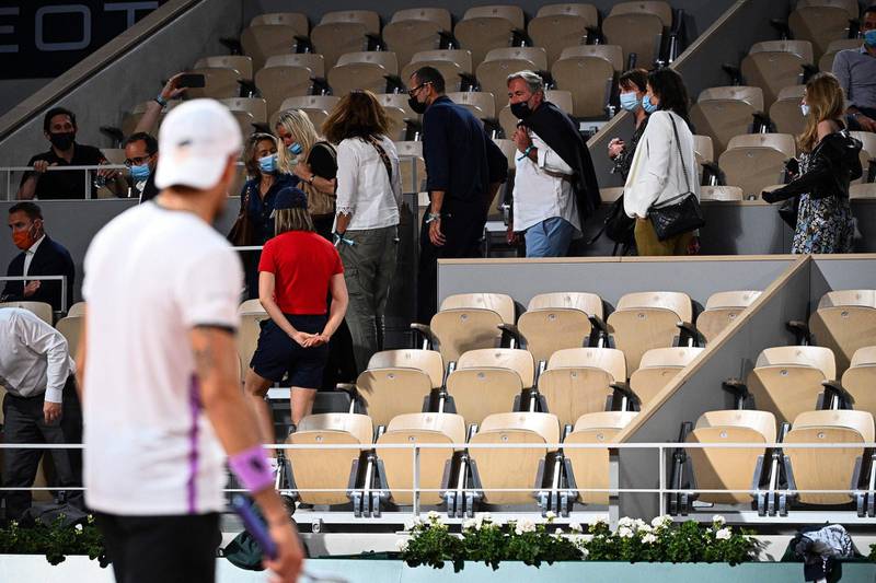 Italy's Matteo Berrettini looks at people leaving the Philippe Chatrier stands. AFP