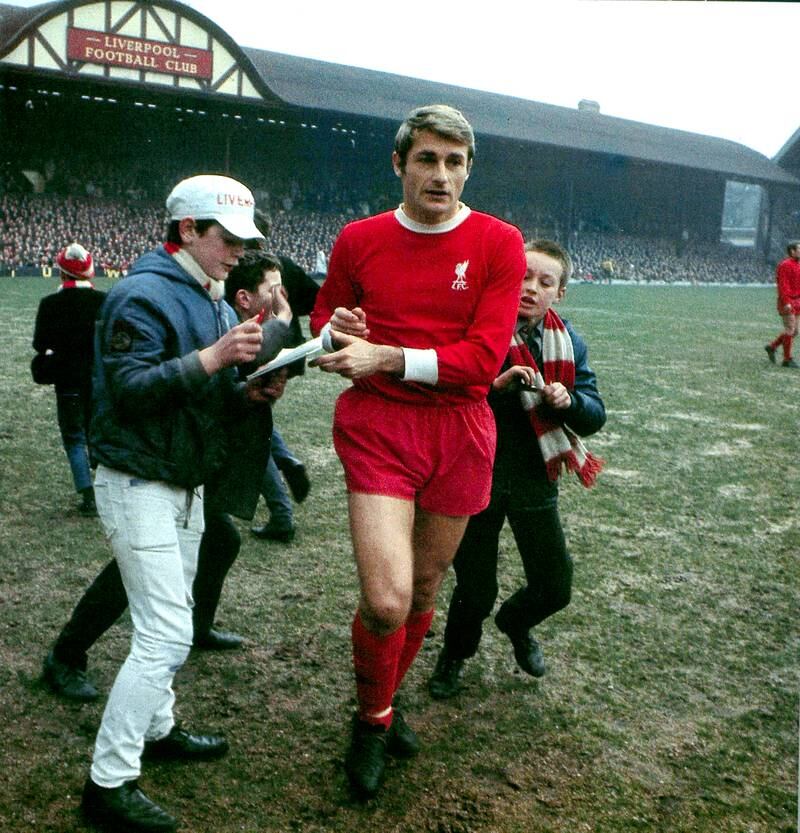 Roger Hunts signs autographs for fans at Anfield in 1969. AFP