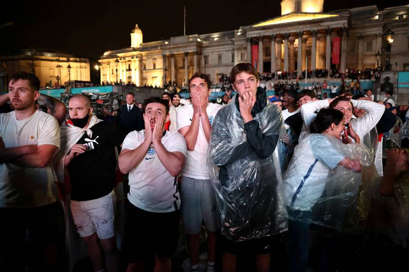 Fans at Trafalgar Square realise their worst fears as England drop a penalty in a shootout against Italy in the Euro 2020 final.