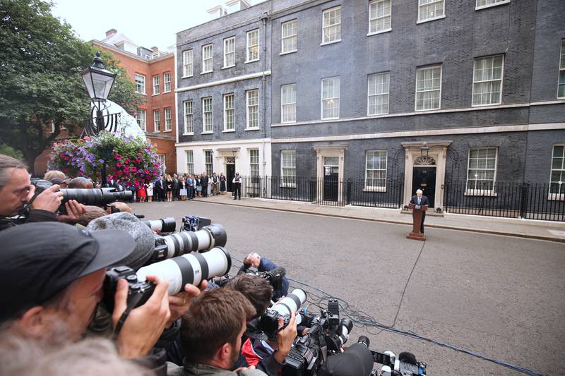 Boris Johnson reads a statement outside 10 Downing Street, formally resigning as Conservative Party leader. PA