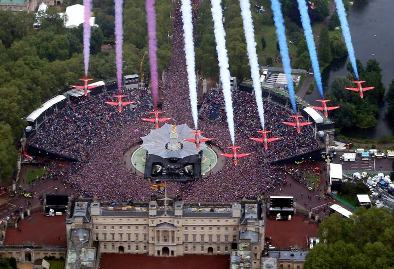 The RAF Red Arrows fly over Buckingham Palace in London, marking Queen Elizabeth II's diamond jubilee celebrations in 2012. PA