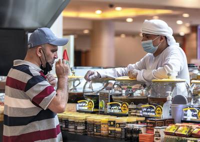 Abu Dhabi residents at the Khalidiyah Mall on June 19th, 2021. Abu Dhabi has temporarily suspended its green pass scheme while a technical fault with Al Hosn app is resolved. Victor Besa / The National.