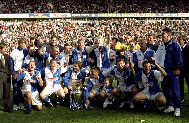 14 May 1995:  The Blackburn Rovers players celebrate after winning the Premiership trophy during the FA Carling Premiership match against Liverpool played at Anfield in Liverpool, England.  The match finished in a 2-1 victory for Liverpool, however, Blackburn Rovers clinched the title from the hands of Manchester United despite losing. \ Mandatory Credit: Clive Brunskill /Allsport