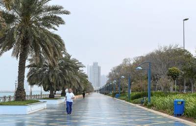 Abu Dhabi, United Arab Emirates - Gloomy weather and slight rain early Friday morning along the Corniche. Khushnum Bhandari for The National
