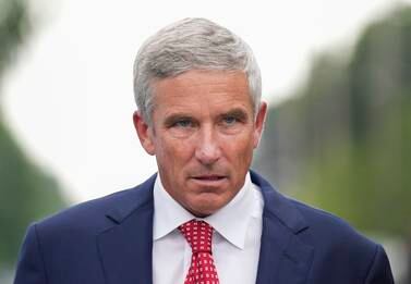 PGA Tour Commissioner Jay Monahan leaves after speaking with sports commentator Jim Nantz regarding the LIV Golf tour during fourth round of the Canadian Open at St.  George's Golf and Country Club in Toronto, Sunday, June 12, 2022.  (Nathan Denette / The Canadian Press via AP)