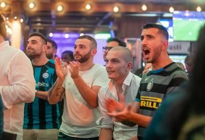 Fans of Manchester City and Inter Milan watch the game at Barasti in Dubai. Ruel Pableo for The National
