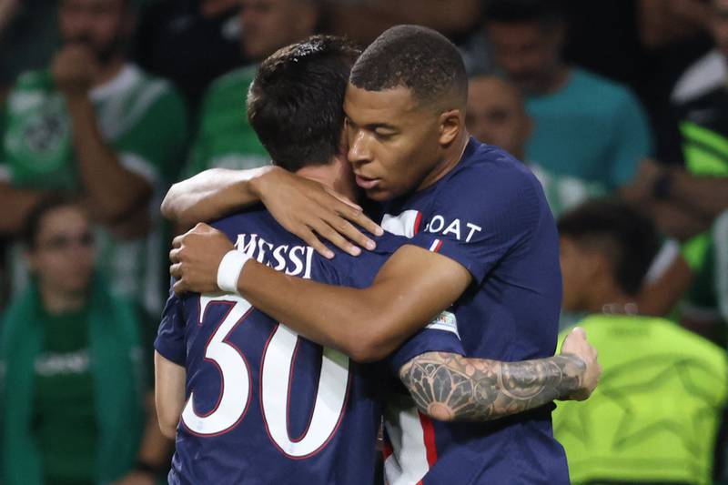 Kylian Mbappe celebrates scoring the second with Messi. AFP