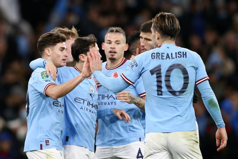 Manchester City's Julian Alvarez celebrates with teammates after scoring the second goal in the 2-0 League Cup win against Chelsea at Etihad Stadium on November 9, 2022. Getty