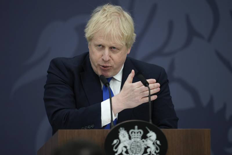 British Prime Minister Boris Johnson delivers a speech to members of the armed services and Maritime and Coastguard Agency at Lydd airport in Kent, south-west England, on Thursday April 14, 2022. PA