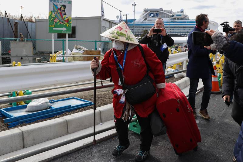 A passenger of Diamond Princess cruise ship leaves Daikoku Pier in Yokohama. Getty Images