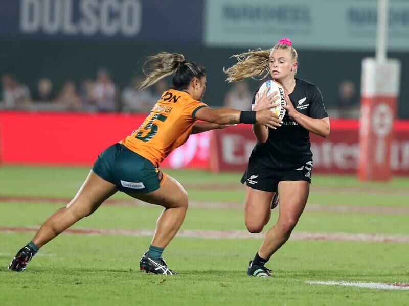 New Zealand's Jorja Miller is tackled by Alysia Lefau-Fakaosilea of Australia.