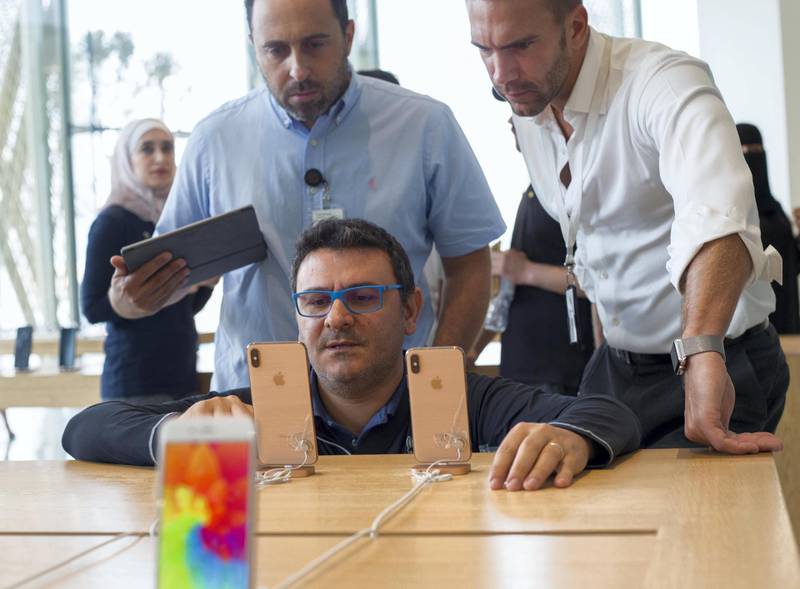 DUBAI, UNITED ARAB EMIRATES, 21 SEPTEMBETR 2018 - iPhone fans at the launch of iPhone XS at Apple store, Dubai Mall.  Leslie Pableo for The National for Alkesh Sharma’s story