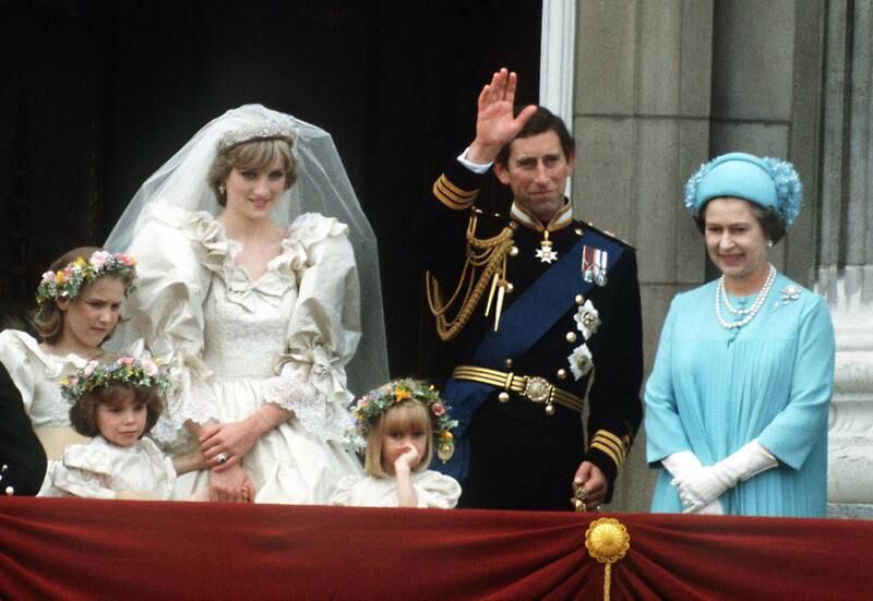 Prince Charles and Princess Diana with the queen on their wedding day in 1981. Getty
