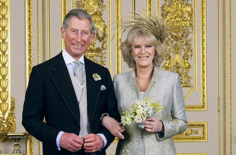 Prince Charles and his new bride Camilla, Duchess of Cornwall, pose in the White Drawing Room at Windsor Castle after their wedding in April 2005.