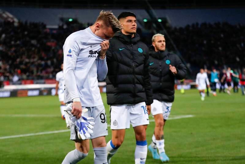 Inter Milan goalkeeper Ionut Radu leaves the pitch after his error contributed to the 2-1 Serie A defeat to Bologna at Renato Dall'Ara Stadium on April 27, 2022. EPA