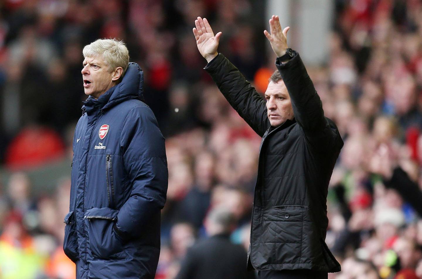 FILE PHOTO: Soccer Football - Liverpool v Arsenal - Barclays Premier League - Anfield - February 8, 2014  Liverpool manager Brendan Rodgers (R) and Arsenal manager Arsene Wenger  Action Images via Reuters/Carl Recine/File Photo  EDITORIAL USE ONLY. No use with unauthorized audio, video, data, fixture lists, club/league logos or live services. Online in-match use limited to 45 images, no video emulation. No use in betting, games or single club/league/player publications.  Please contact your account representative for further details.