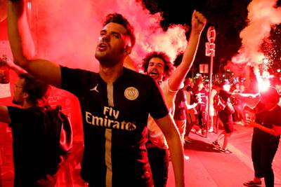 Paris Saint-Germain supporters celebrate their team's 3-0 win over RB Leipzig in Paris. AFP
