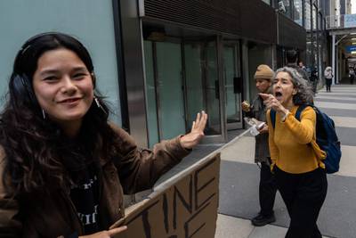 Nicole Izsak, right, confronts a Palestinian supporter near the Israeli consulate in New York, claiming her cousin is being held hostage in Gaza. AFP