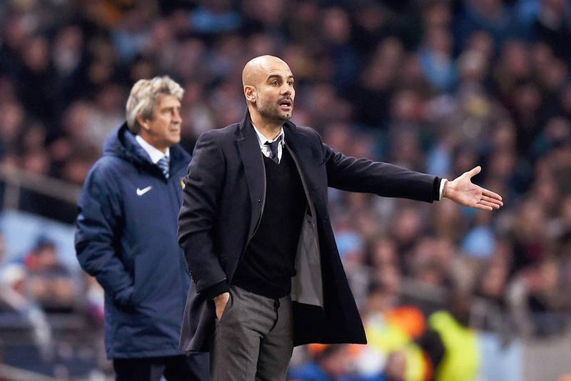 If Manchester City look to replace Manuel Pellegrini, behind, Pep Guardiola, front, could be a strong choice to replace the manager. Laurence Griffiths / Getty Images