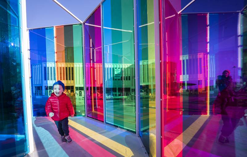 Young Caleb Owen interacts with art installation 'Her Hymn to the Big Wheel' on Friday, an immersive sculptural work by artist Liz West which forms the centrepiece of the Love Barnsley Festival. PA