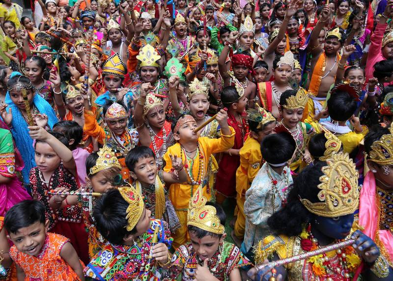 Children dressed as Krishna attend Janmashtami celebrations inside a school in Ahmedabad. Reuters