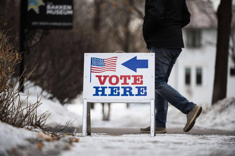 Signage directs voters outside the Bakken Museum in Minneapolis, Minnesota. AFP