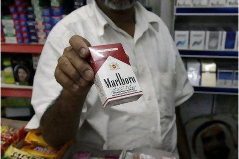Neighbourhood grocery stores appear to be less stringent in checking IDs of cigarette buyers.
Jaime Puebla / The National