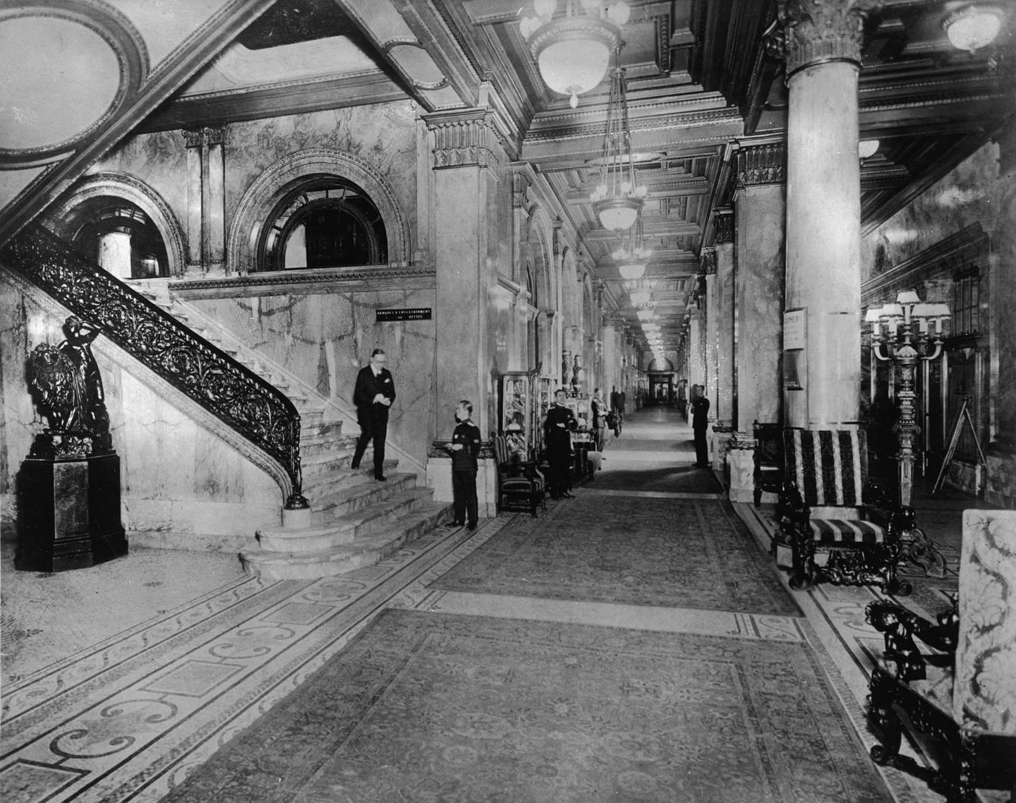 Members of the Waldorf Astoria hotel staff stand in Peacock Alley awaiting guests in the 1910s. Getty Images