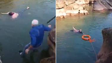 Stephen Ellison threw off his shoes and jumped into the river. British Embassy Beijing/Twitter