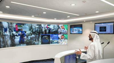 Sheikh Mohammed bin Rashid, Vice President and Ruler of Dubai, talks with Emirati astronaut Maj Hazza Al Mansouri, during a live satellite feed from the International Space Station. Courtesy: Dubai Media Office