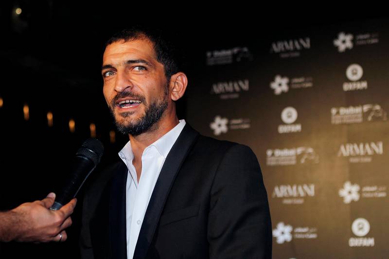 Dubai, December 14, 2012 -- Egyptian actor Amr Waked arrives on the red carpet during the Dubai Cares and Oxfam Charity Gala at Armani Hotel in Dubai, December 14, 2012. (Photo by: Sarah Dea/The National)