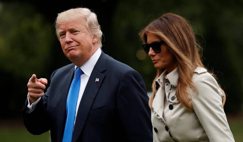 U.S. President Donald Trump and first lady Melania Trump return to the White House in Washington, DC, U.S. October 13, 2017. REUTERS/Kevin Lamarque