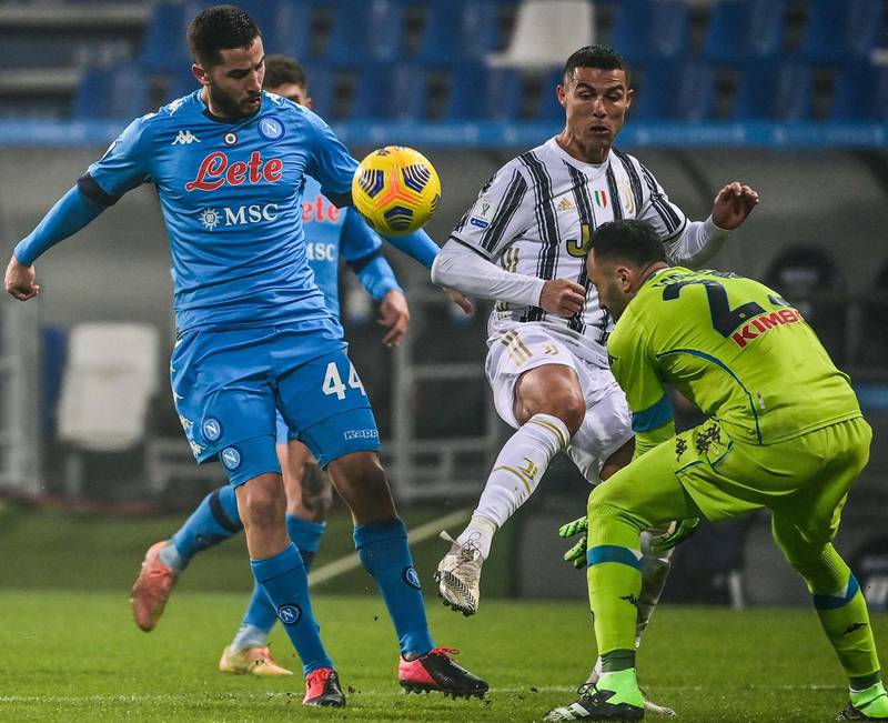 Napoli defender Konstantinos Manolas tackles Juventus' Cristiano Ronaldo. AFP