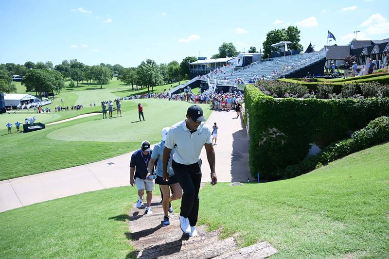Tiger Woods walks from the 18th green following a practice round ahead of the 2022 PGA Championship. AFP
