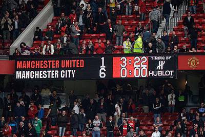 The scoreboard at Old Trafford says it all as Manchester City record an historic win over rivals United.

Jon Super / AP Photo