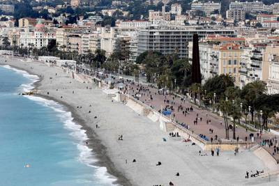 People walk on the Promenade des Anglais during  lockdown in Nice, southern France. EPA