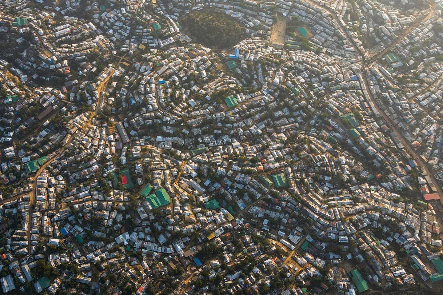 TOPSHOT - In this aerial picture taken on December 4, 2020, the Kutupalong camp for Rohingya refugees is pictured in Ukhia. / AFP / -
