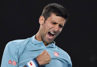 Novak Djokovic celebrates after defeating Fernando Verdasco in their first-round match at the Australian Open in Melbourne, Australia, on January 17, 2017. Andy Brownbill / AP
